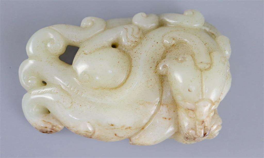 A Chinese pale celadon jade figure of a chilong, 10.2cm